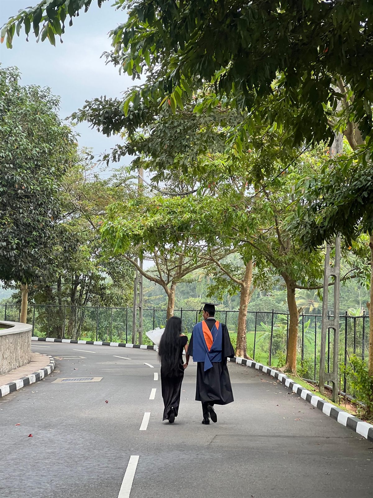 Rasith and Sadheera walking hand in hand